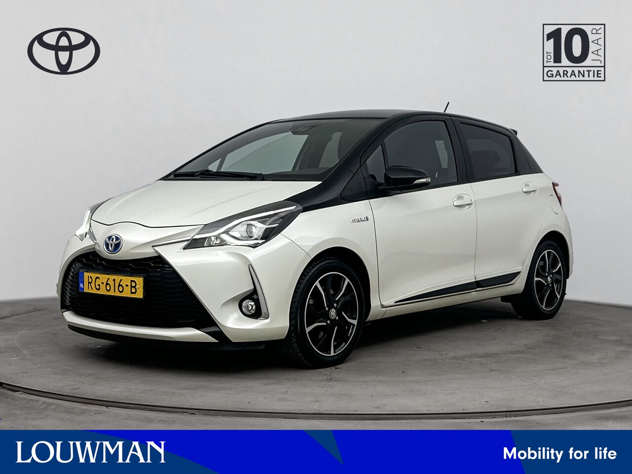 Toyota Yaris - 1.5 Hybrid Bi-Tone | Lichtmetalen Velgen | Mistlampen | Cruise Control + Climate Control | - AutoWereld.nl