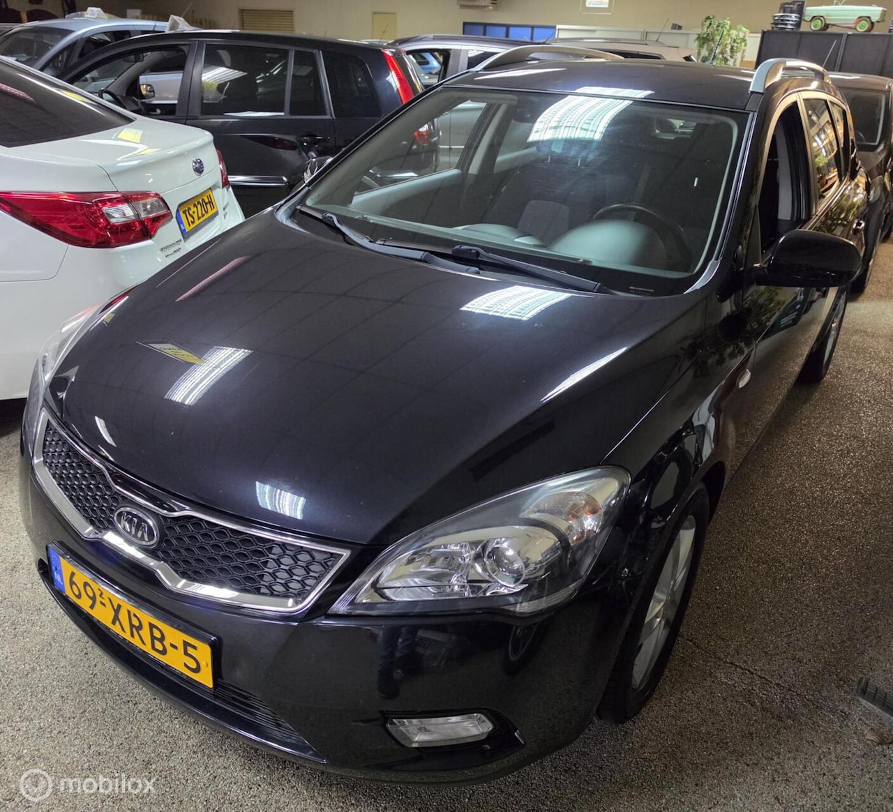 Kia Cee'd Sporty Wagon - 1.4 CVVT Navigator Plus Pack 1.4 CVVT Navigator Plus Pack - AutoWereld.nl
