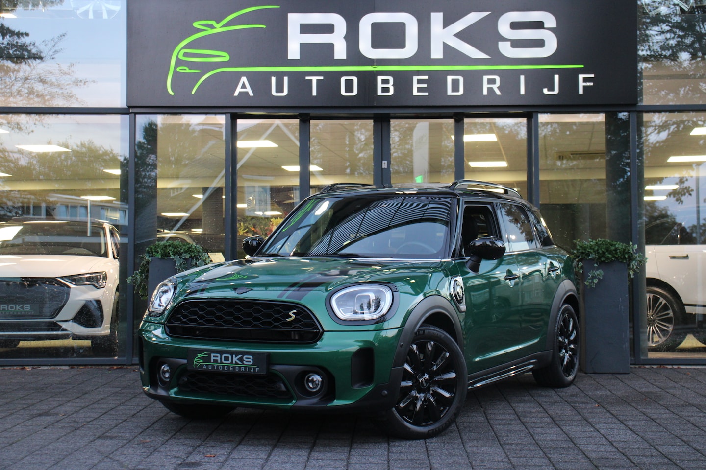 MINI Countryman - 1.5 Cooper S E ALL4 ALL4 Navi/Camera/Keyless/Memory/Sfeerverlichting/Panoramadak/Leder/18I - AutoWereld.nl