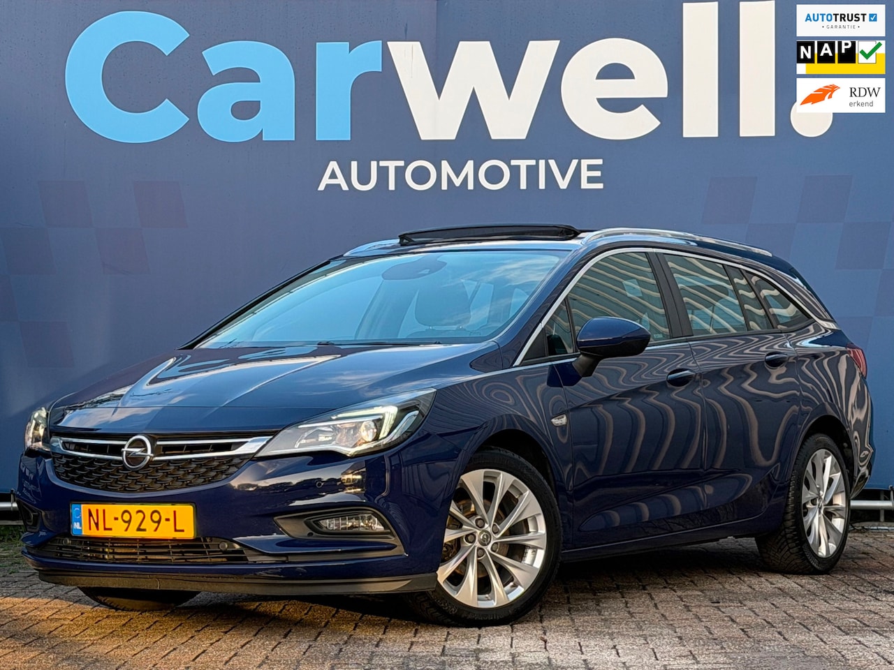 Opel Astra Sports Tourer - 1.0 Online Edition +|Trekhaak|Pano|Stoel+StuurVW|Camera|Climate|Cruise|Navi|LMV|PDC V+A|N. - AutoWereld.nl