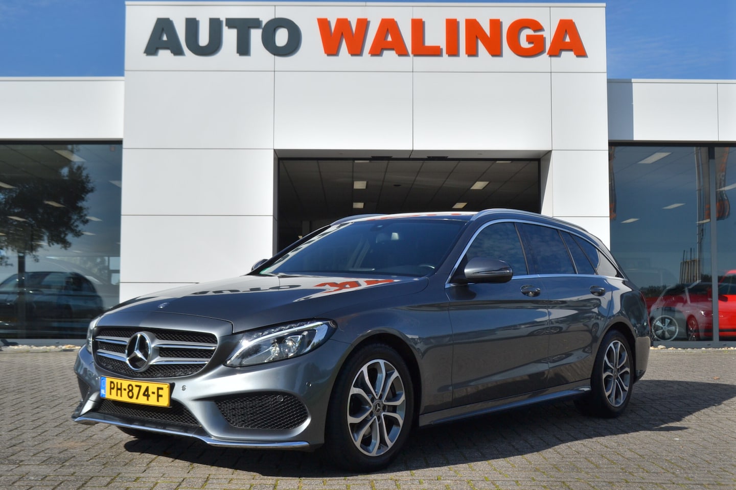 Mercedes-Benz C-klasse Estate - 180 AMG Panoramadak | Leer | Camera | Trekhaak 1800kg | Led | Navi | - AutoWereld.nl