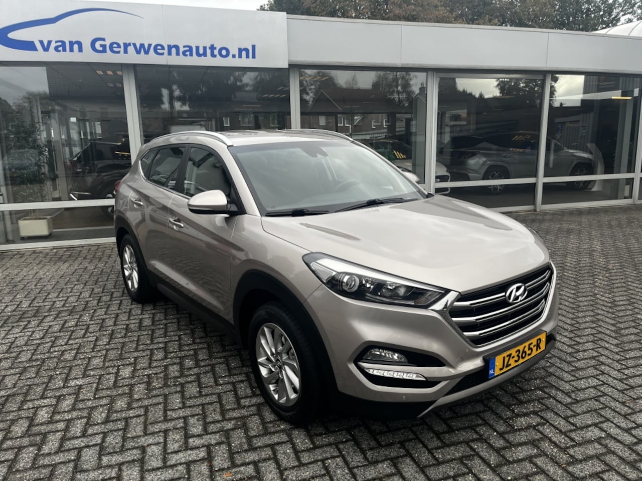 Hyundai Tucson - 1.6 T-GDi Comfort | Navi | Camera | Cruise | Trekhaak | 1900kg Trekgewicht!! - AutoWereld.nl