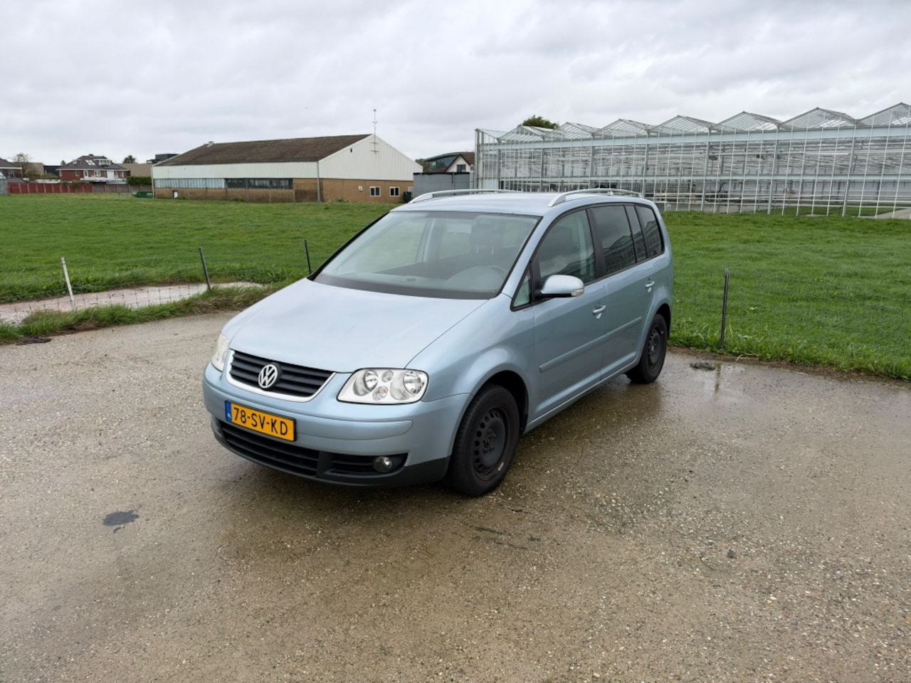Volkswagen Touran - 2.0 110KW Highline - AutoWereld.nl