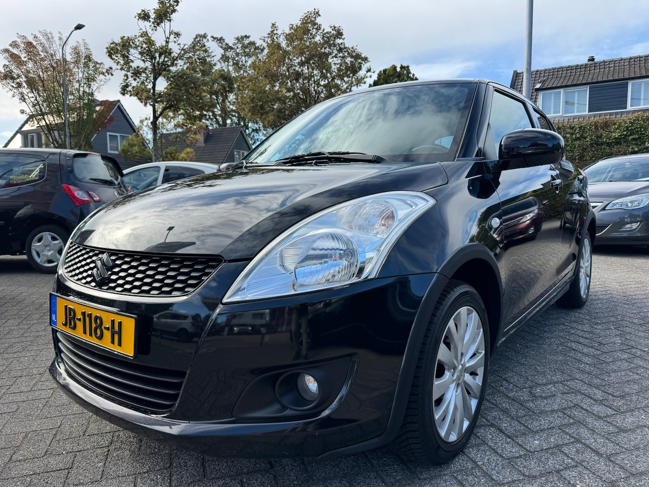 Suzuki Swift - 1.2 Comfort 4x4,5Drs,Apk 4/5/27,Airco,Elek-pakket - AutoWereld.nl