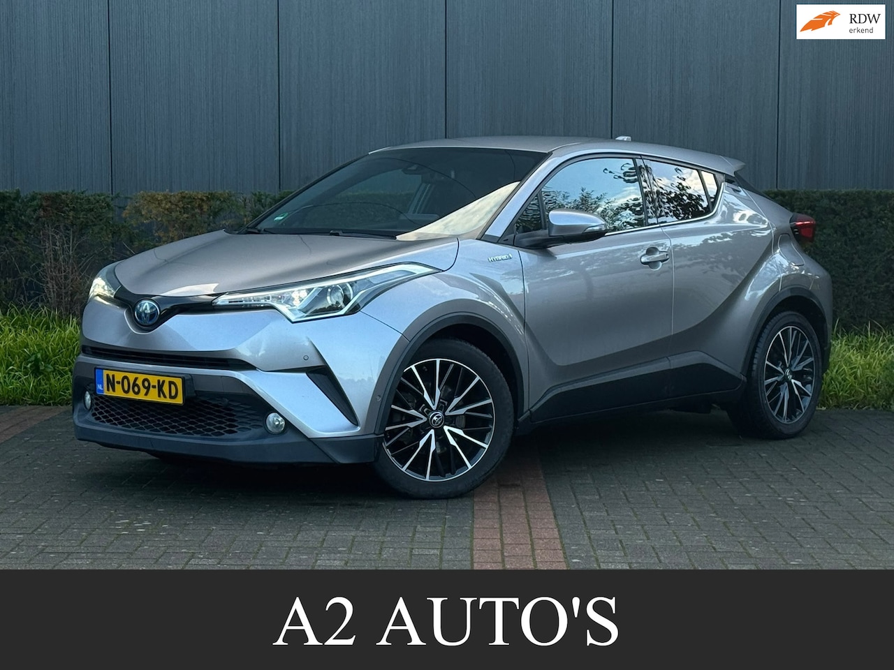 Toyota C-HR - 1.8 Hybrid Bi-Tone Leer|Navi|Camera|JBL - AutoWereld.nl