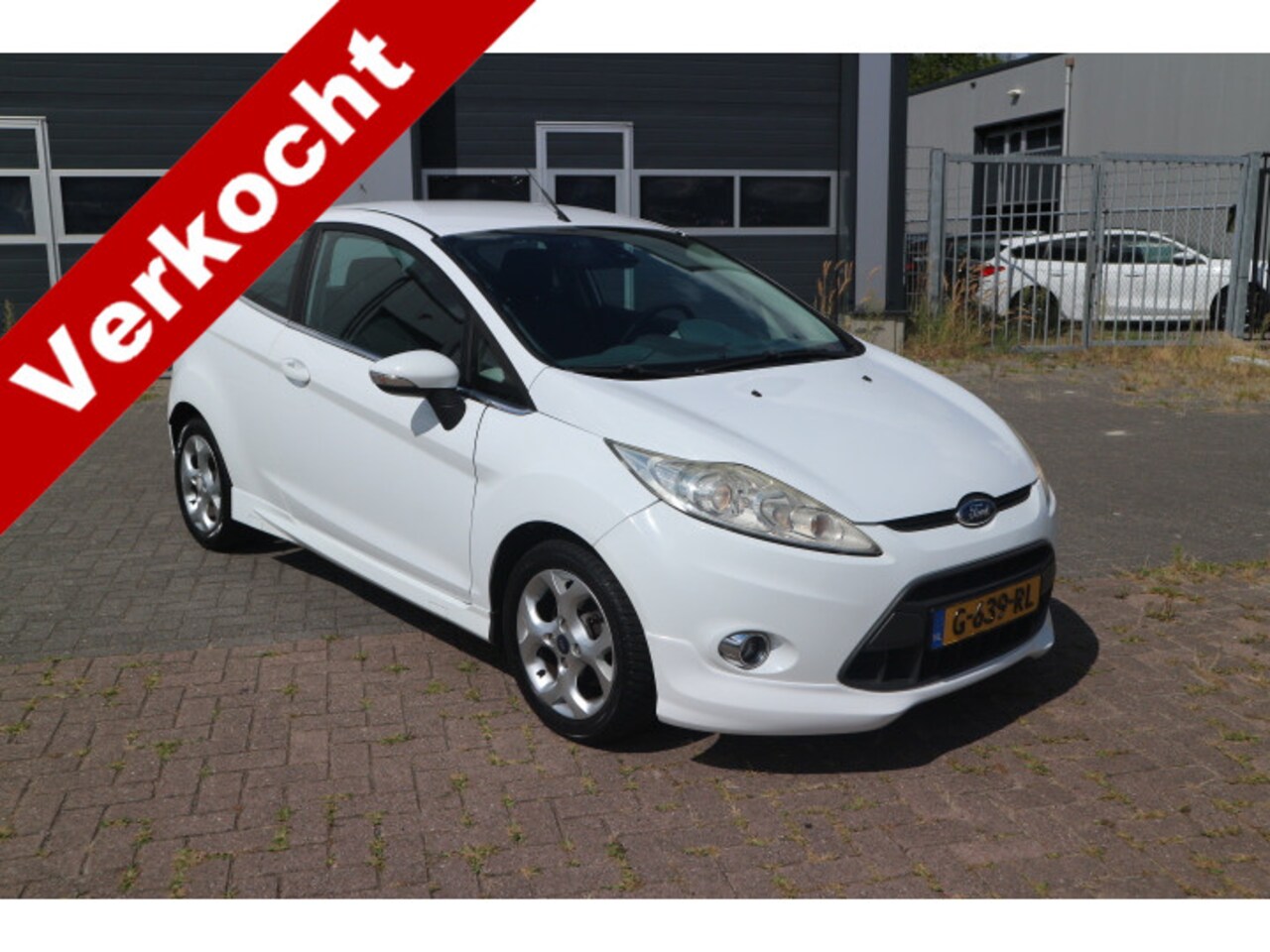 Ford Fiesta - 1.25 Ghia 1.25 Ghia - AutoWereld.nl