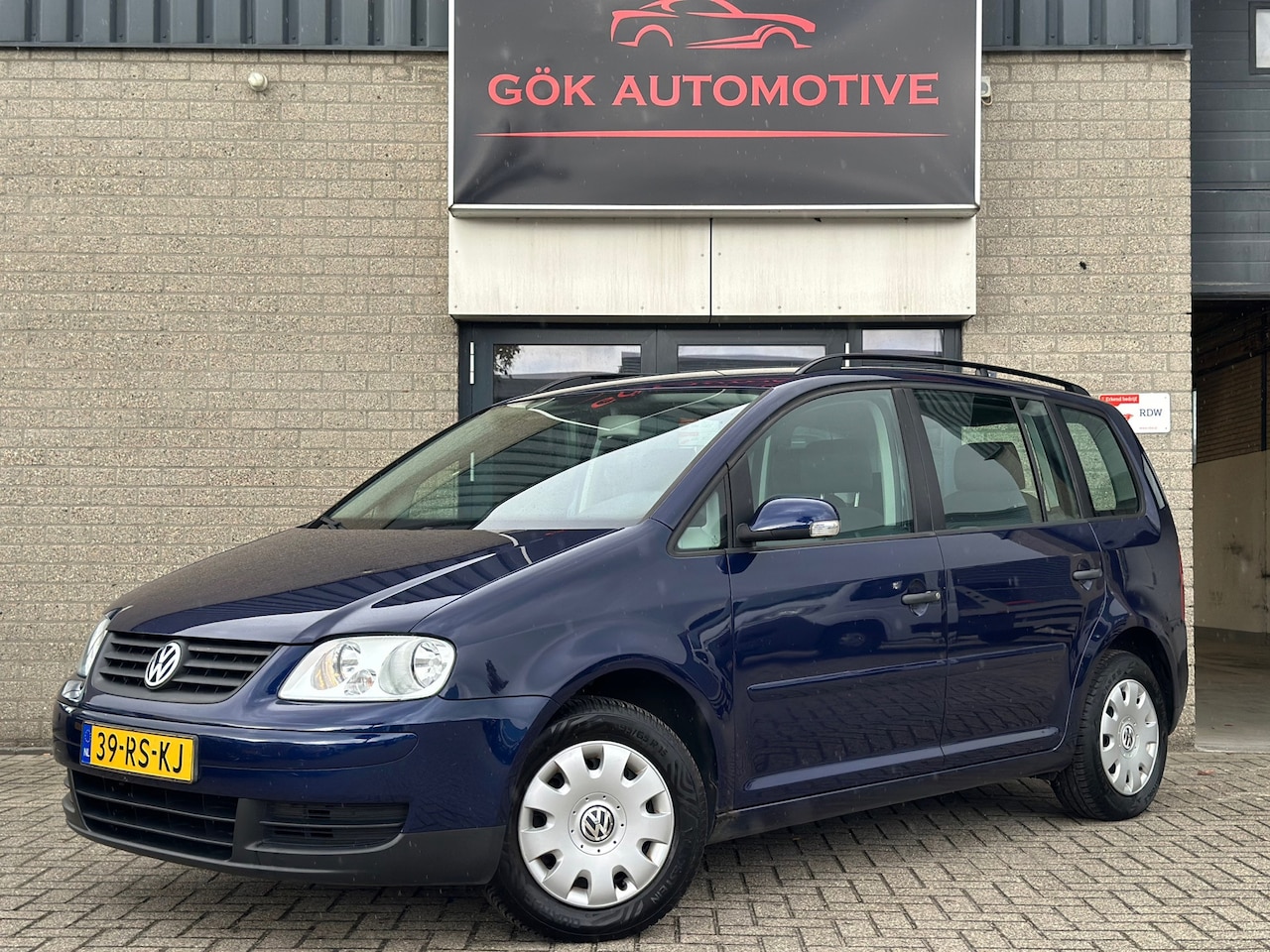 Volkswagen Touran - 1.6 Business / Airco / Carplay / Cruise Control / NAP - AutoWereld.nl