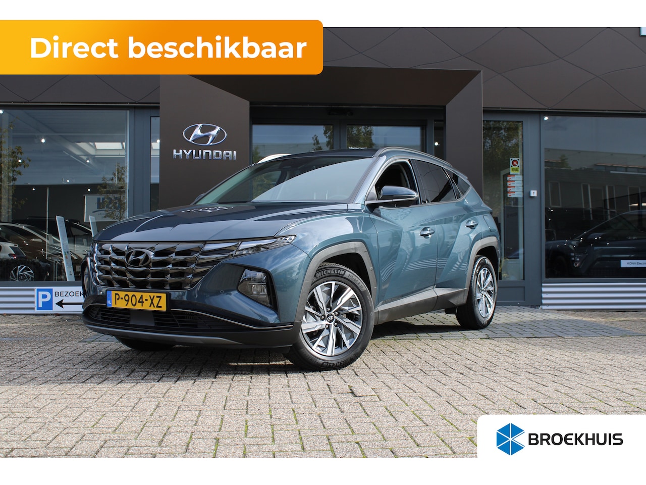 Hyundai Tucson - 1.6 T-GDI HEV Comfort | Achteruitrijcamera | Audio installatie | Buitenspiegels elektrisch - AutoWereld.nl