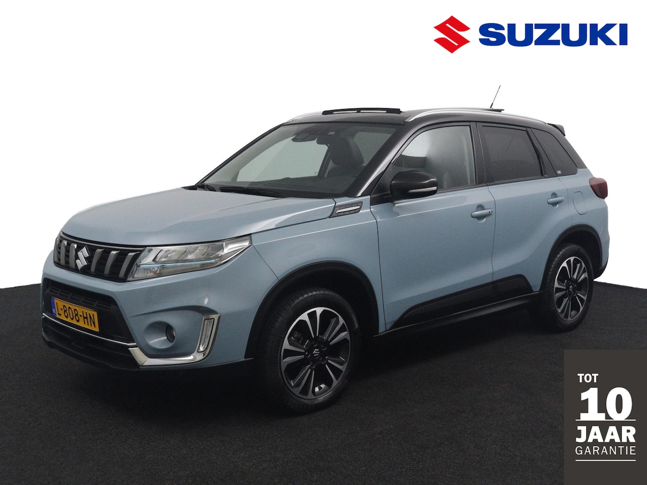 Suzuki Vitara - 1.4 Boosterjet Style Smart Hybrid Automaat | Schuif\ Kanteldak | Trekhaak | Keyless Entry - AutoWereld.nl