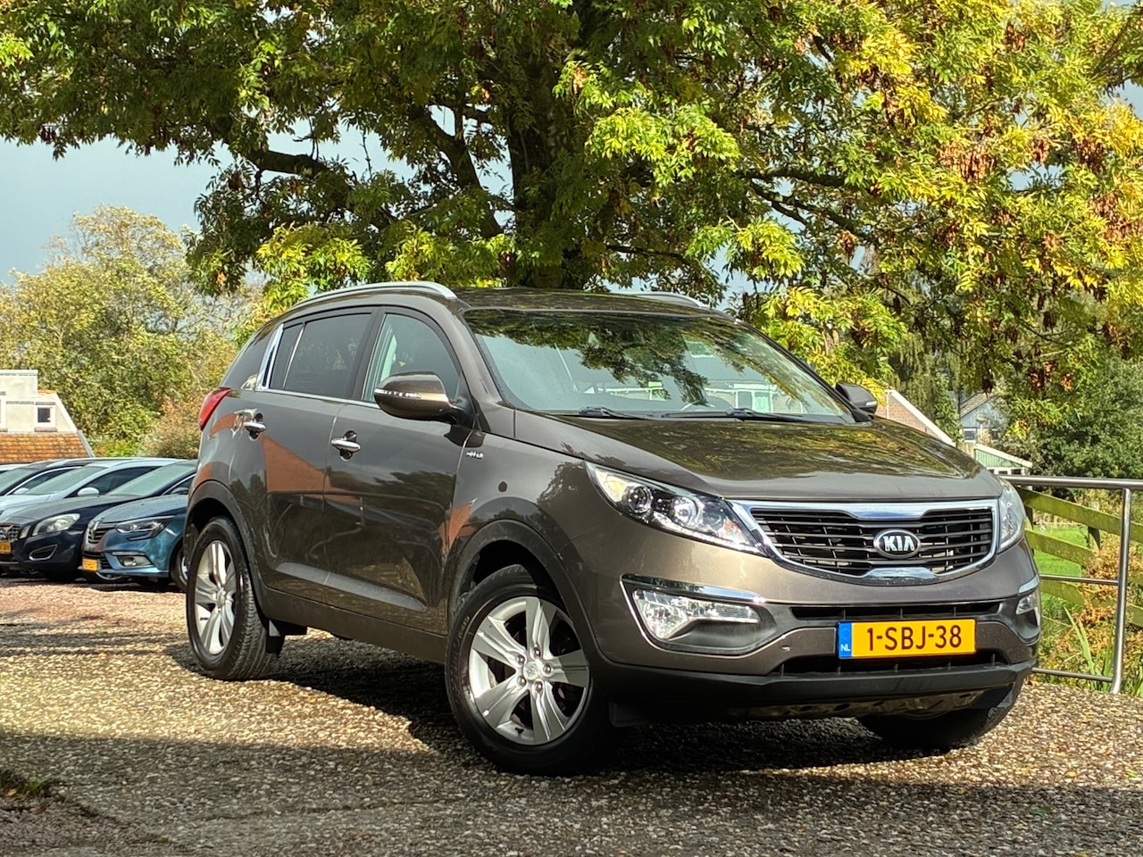 Kia Sportage - 2.0 Plus Pack AWD | 1e eigenaar + Automaat + 4x4 + Clima nu € 13.975,-!!! - AutoWereld.nl