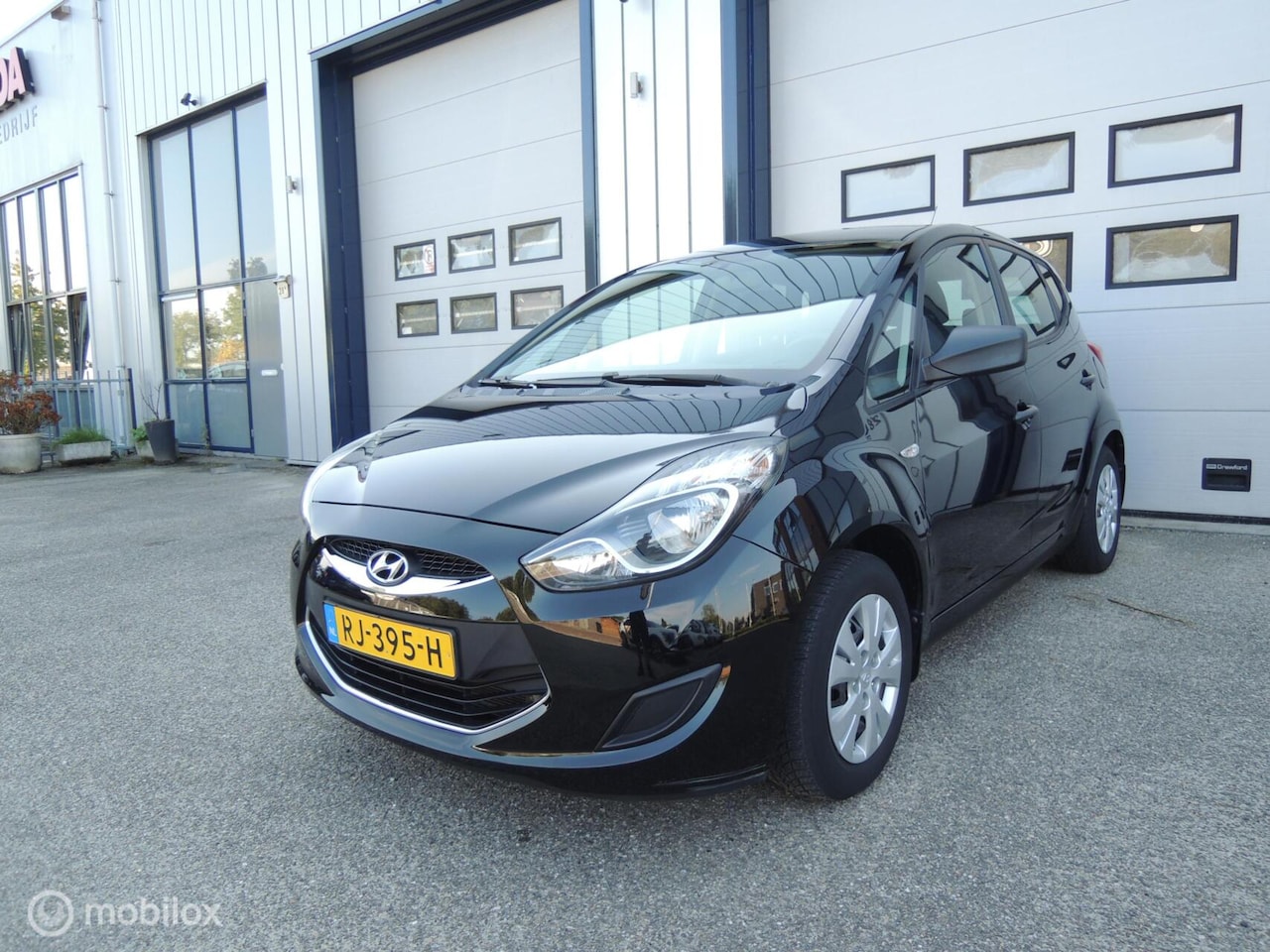 Hyundai ix20 - 1.4i, Nette auto met deuk in r.deur 1.4i i-Vision - AutoWereld.nl