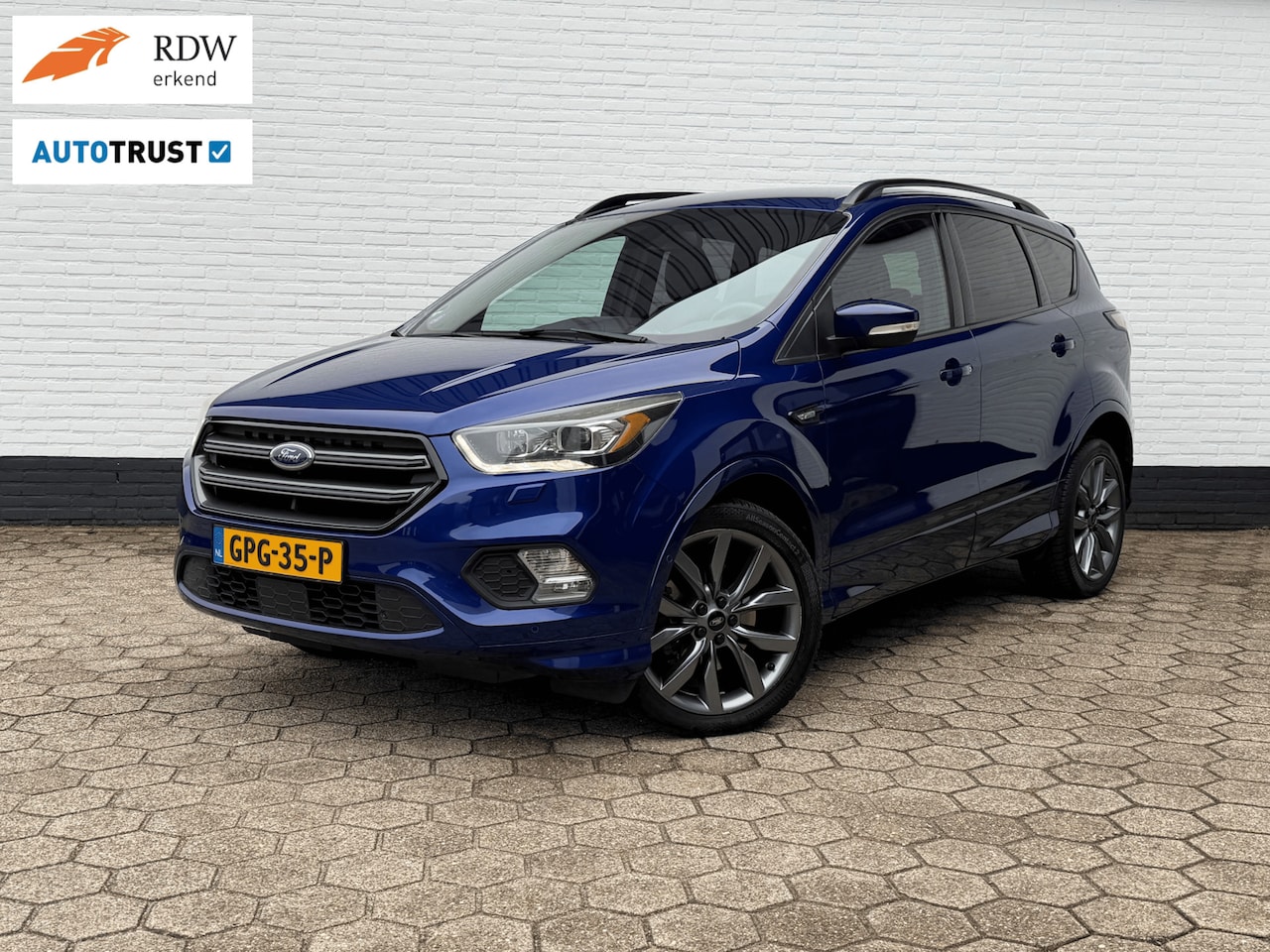 Ford Kuga - 1.5 ST-Line 4WD 182PK AUTOMAAT l TREKHAAK l CAMERA! - AutoWereld.nl