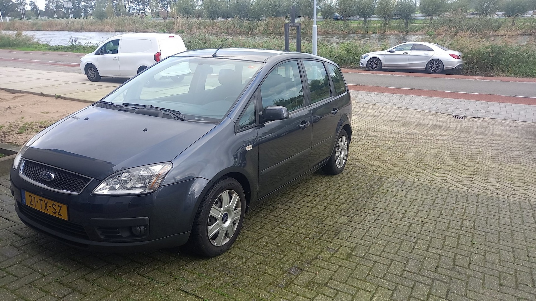 Ford Focus C-Max - 1.6 TDCi AIRCO/CRUISE/148800KM NAP!/TREKHAAK - AutoWereld.nl