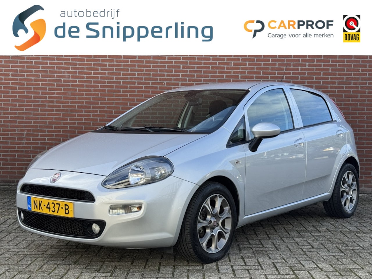 Fiat Punto Evo - 0.9 TwinAir Lounge CLIMA CRUISE NAV TREKHAAK PDC LMV - AutoWereld.nl