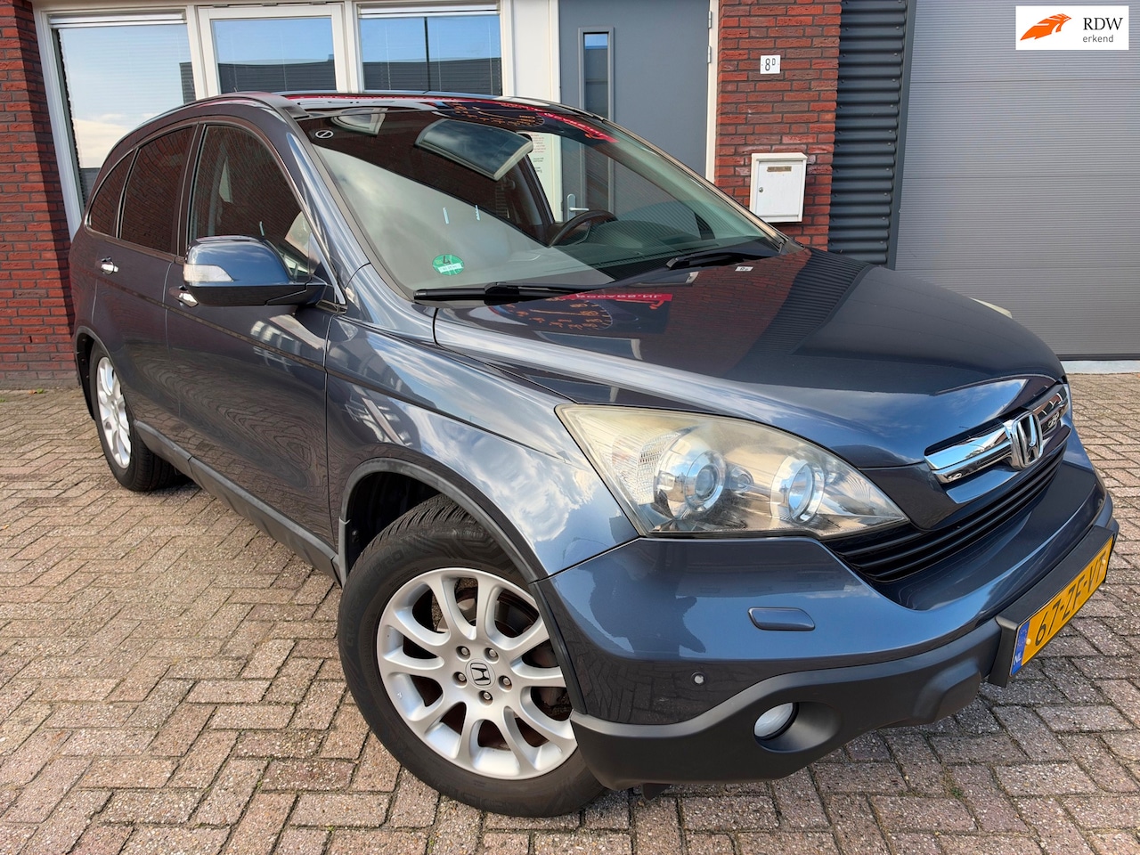 Honda CR-V - 2.0i Executive / Pano / Navi / Leder / PDC / Camera / AUT / Stoelverwarming - AutoWereld.nl