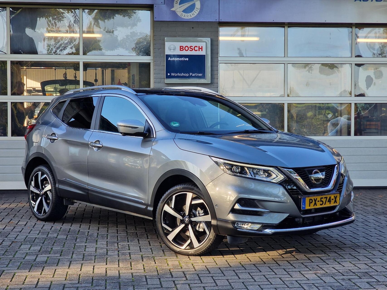 Nissan Qashqai - 1.2 Tekna +|Leer|Pano|BOSE|360'camera|Cruise|Clima|PDC| - AutoWereld.nl