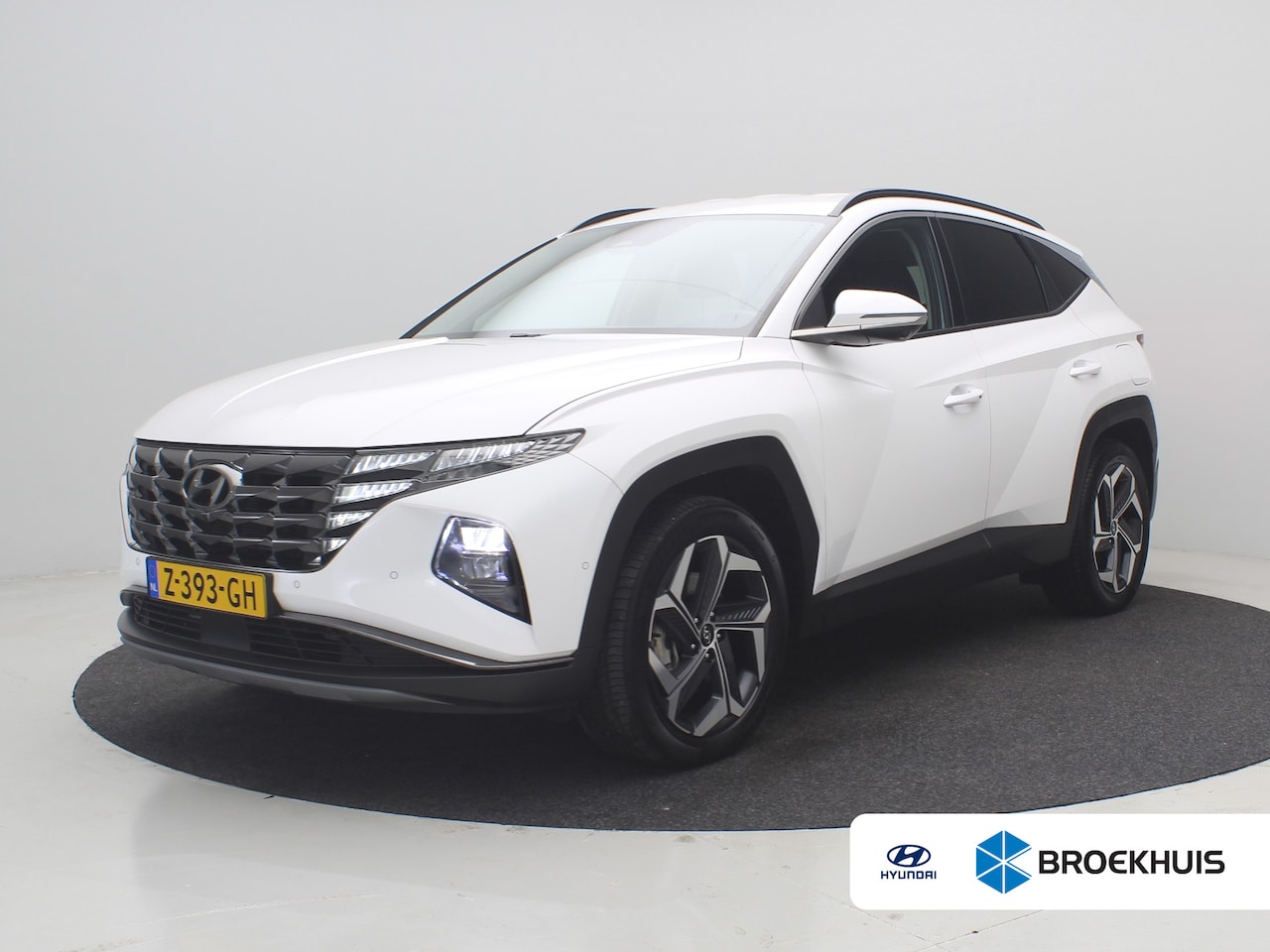 Hyundai Tucson - 1.6 T-GDI 265pk PHEV Premium 4WD | Leder | Carplay | Climate | Keyless | Navigatie | Elek. - AutoWereld.nl