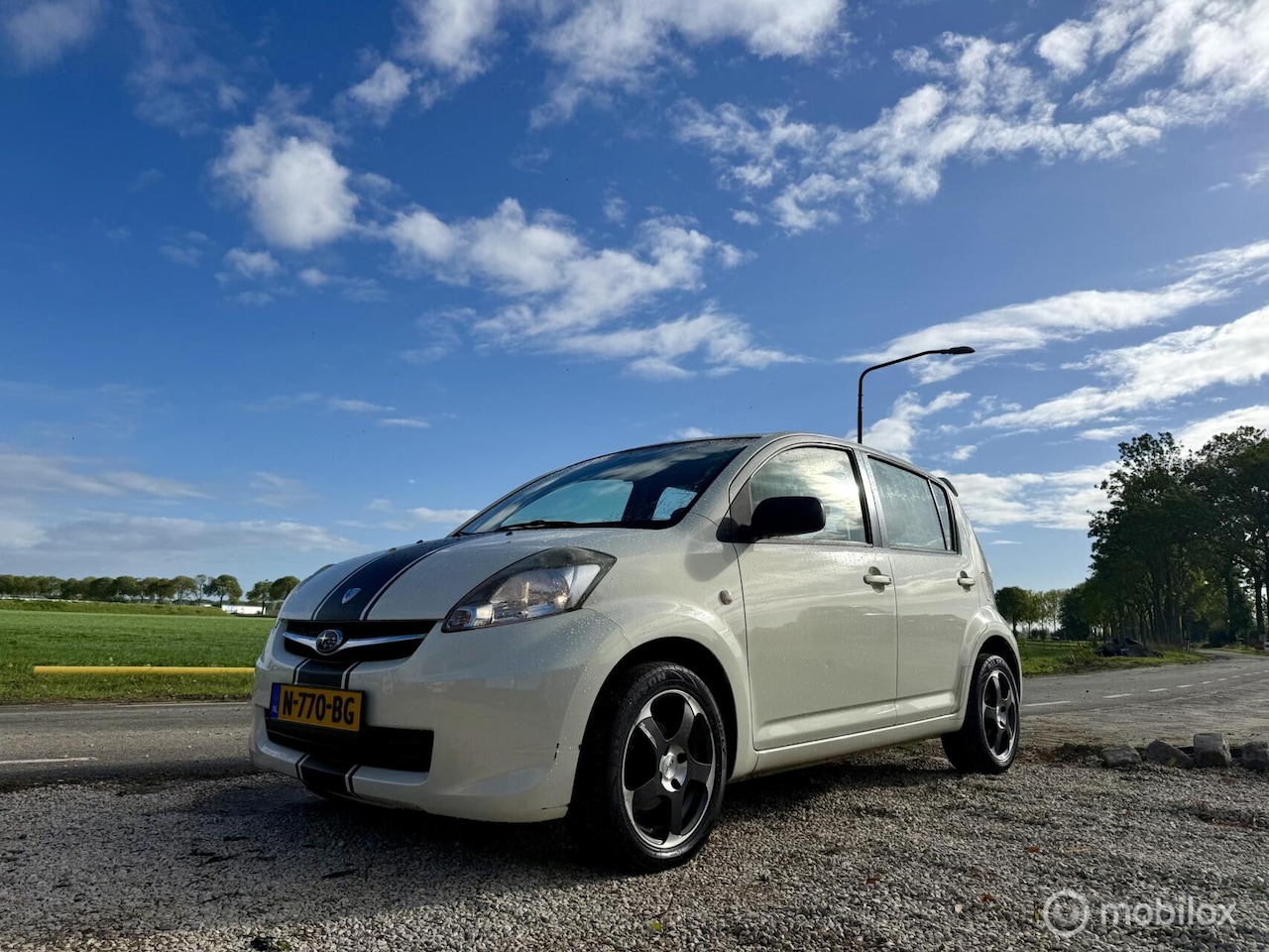 Subaru Justy - 1.0 Black & White, BJ 2010, Airco, APK Jul 2027 - AutoWereld.nl