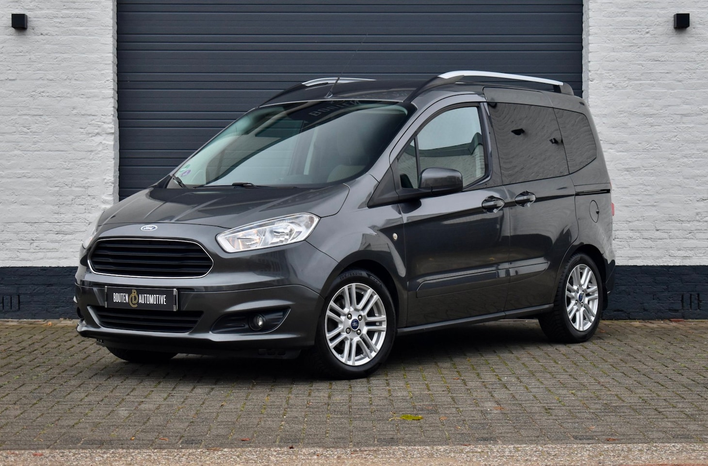 Ford Tourneo Courier - 1.0 Titanium |Trekhaak|Stoelverwarming|Clima| - AutoWereld.nl