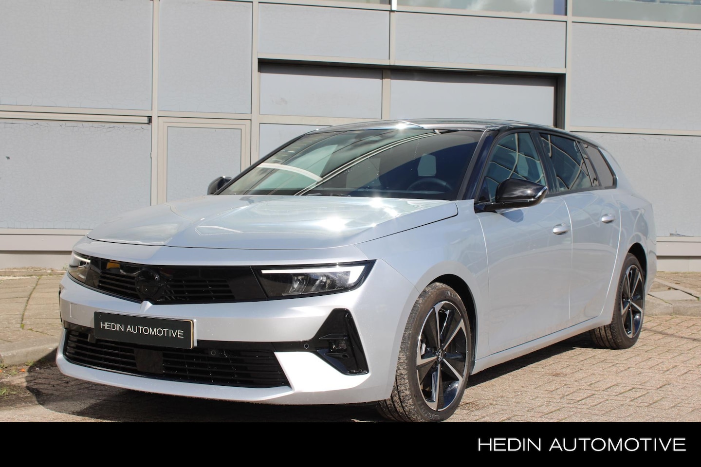 Opel Astra Sports Tourer - 1.2 145pk Hybrid GS | Navigatie | Adaptive Cruise Control | Stuur/Stoelverwarming | Camera - AutoWereld.nl