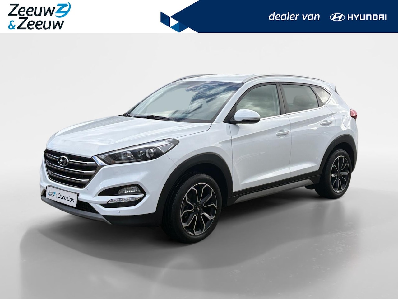 Hyundai Tucson - 1.6 GDi Comfort | Navi | Stoelverwarming | Clima | Trekhaak - AutoWereld.nl