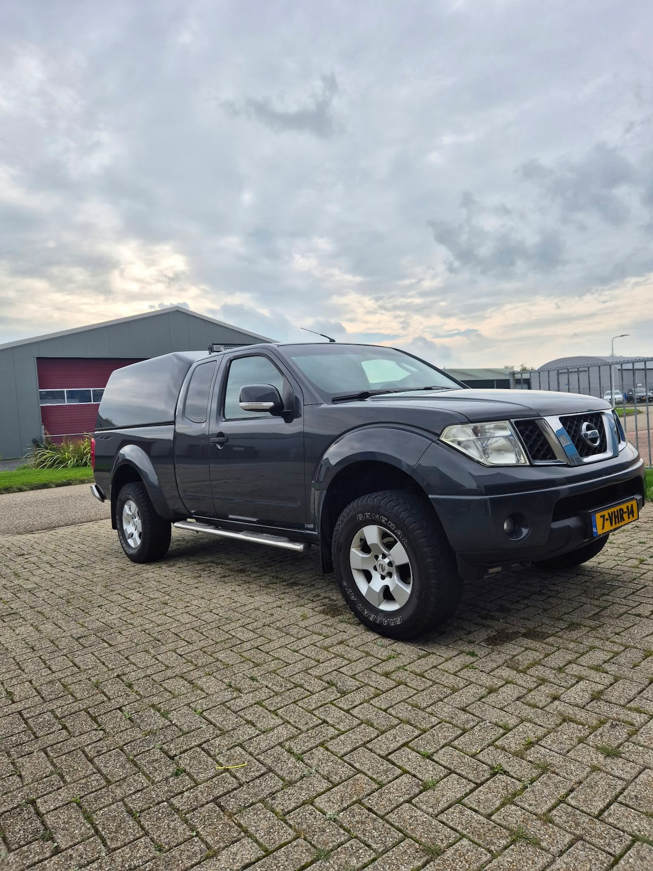 Nissan Navara - 2.5 dCi XE King Cab - AutoWereld.nl