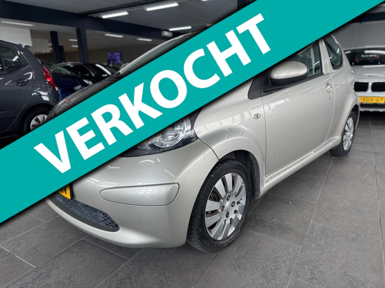 Toyota Aygo - 1.0-12V + airco elektrische pakket half leer lm-velgen 117 dzkm nap. - AutoWereld.nl