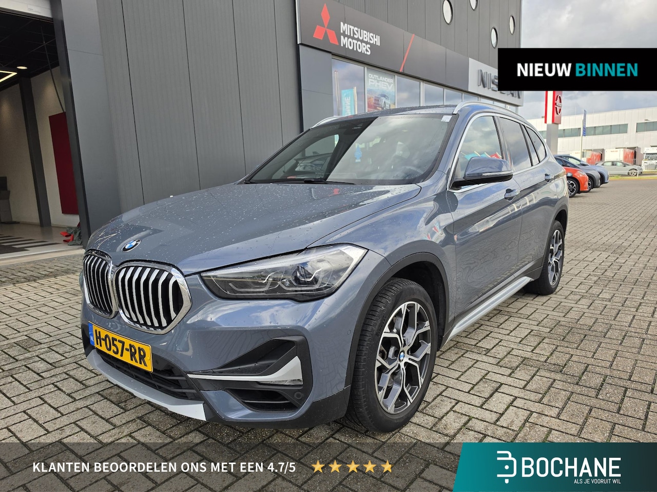 BMW X1 - sDrive20i VDL Nedcar Edition | Panoramadak | Trekhaak | El. achterklep - AutoWereld.nl