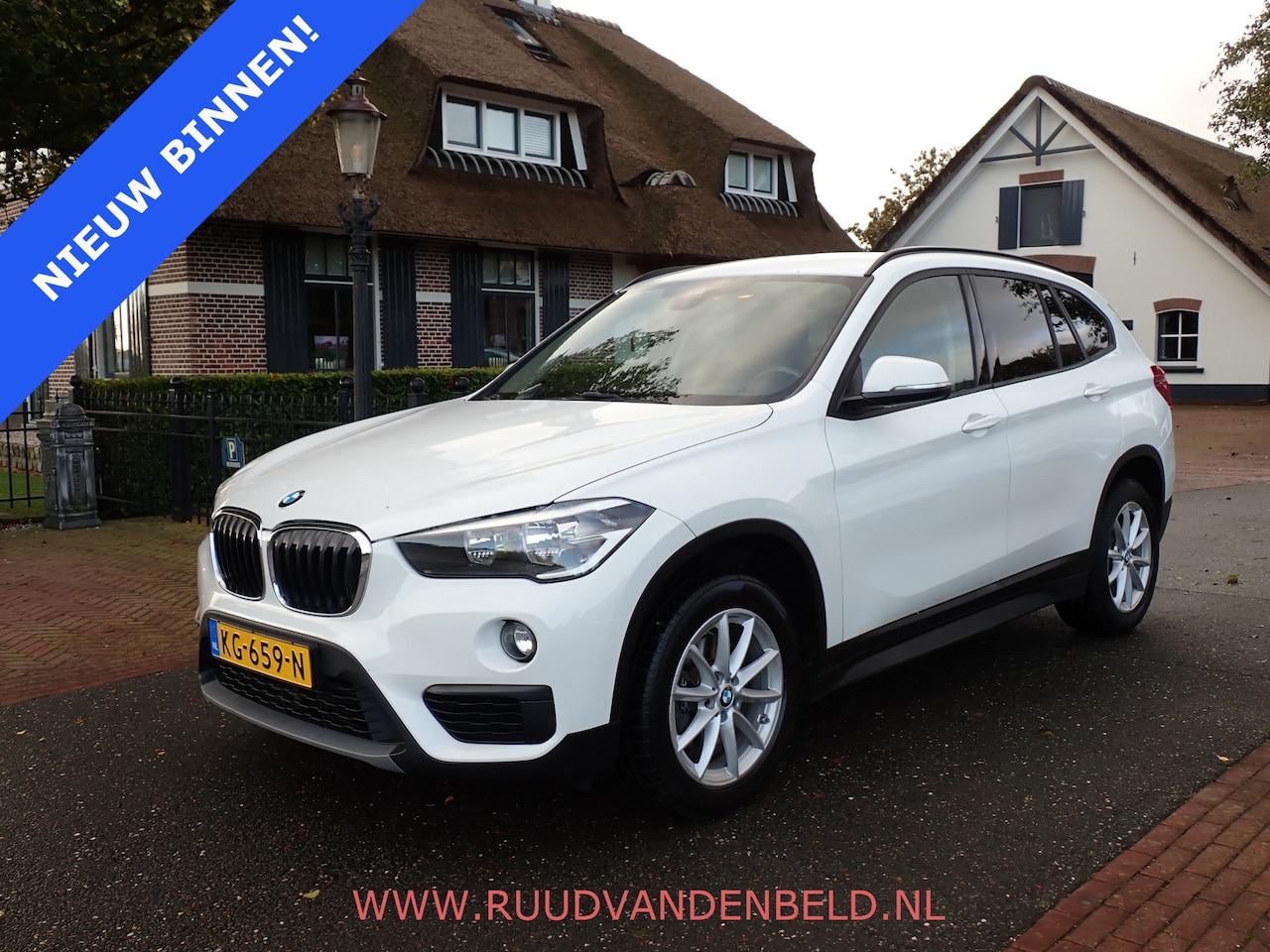 BMW X1 - sDrive18i / CRUISE / PDC / NAVI / STOELVERWARMING - AutoWereld.nl