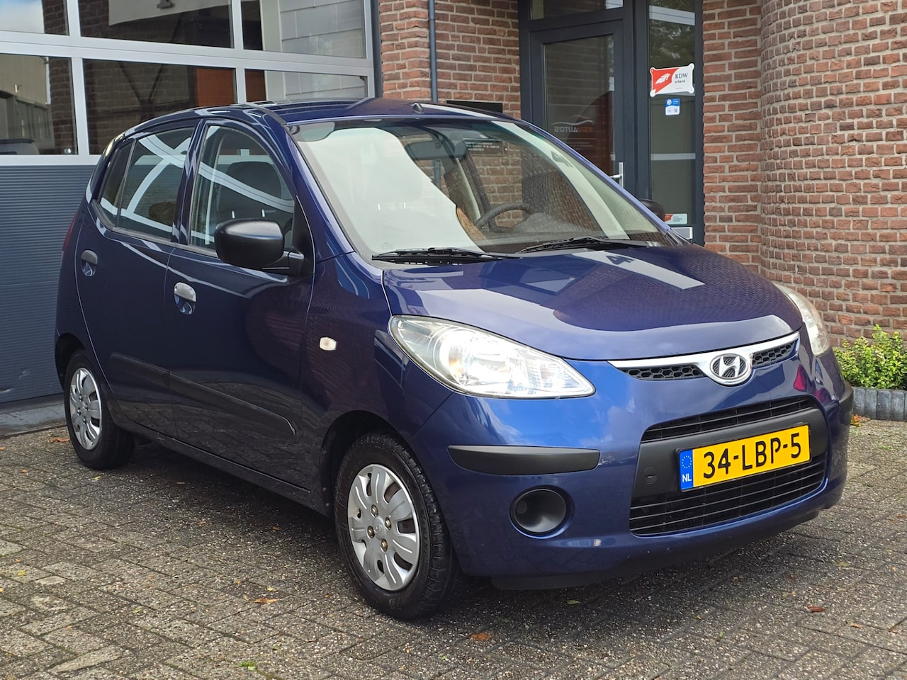 Hyundai i10 - 1.1 Active Cool UNIEK |Lage km |Nap - AutoWereld.nl
