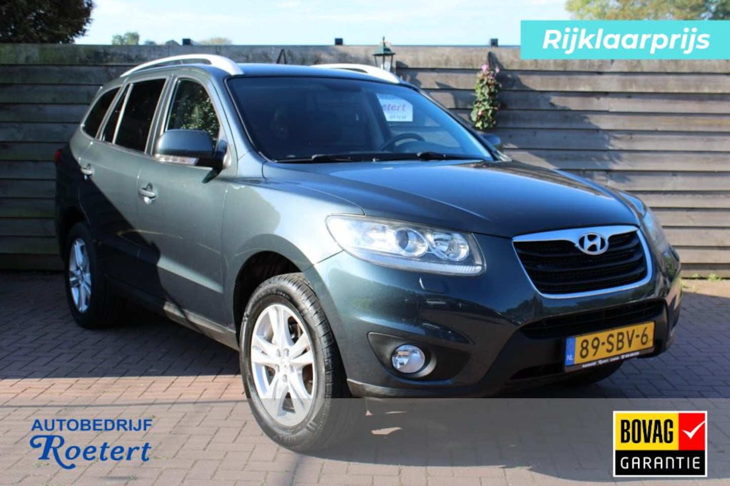 Hyundai Santa Fe - 2.4i 174pk Business Ed. ECC/cruise/navi/leer/camera/trekhaak/schuifdak - AutoWereld.nl