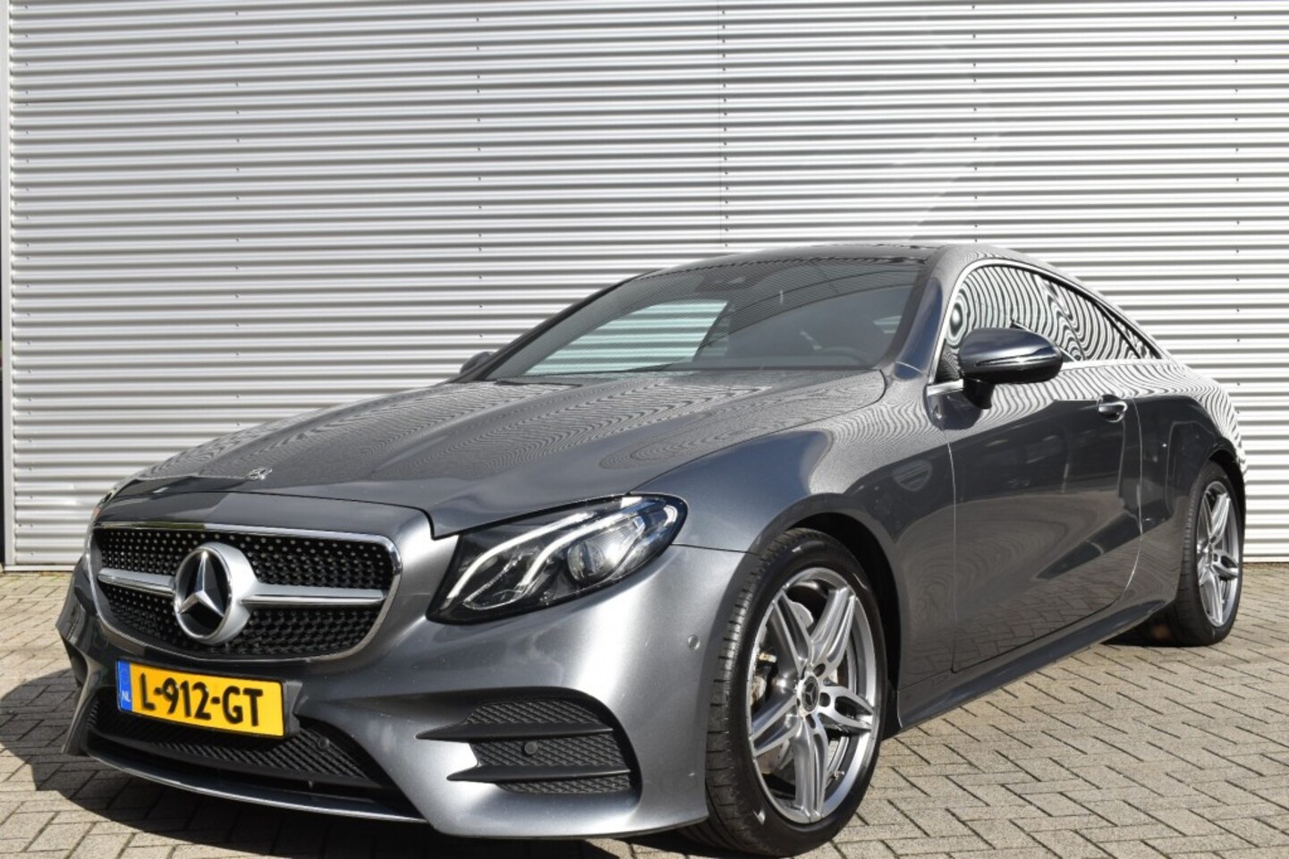 Mercedes-Benz E-klasse - COUPE 200 PREMIUM AMG STYLING / P.DAK / LEDER / WIDESCREEN - AutoWereld.nl