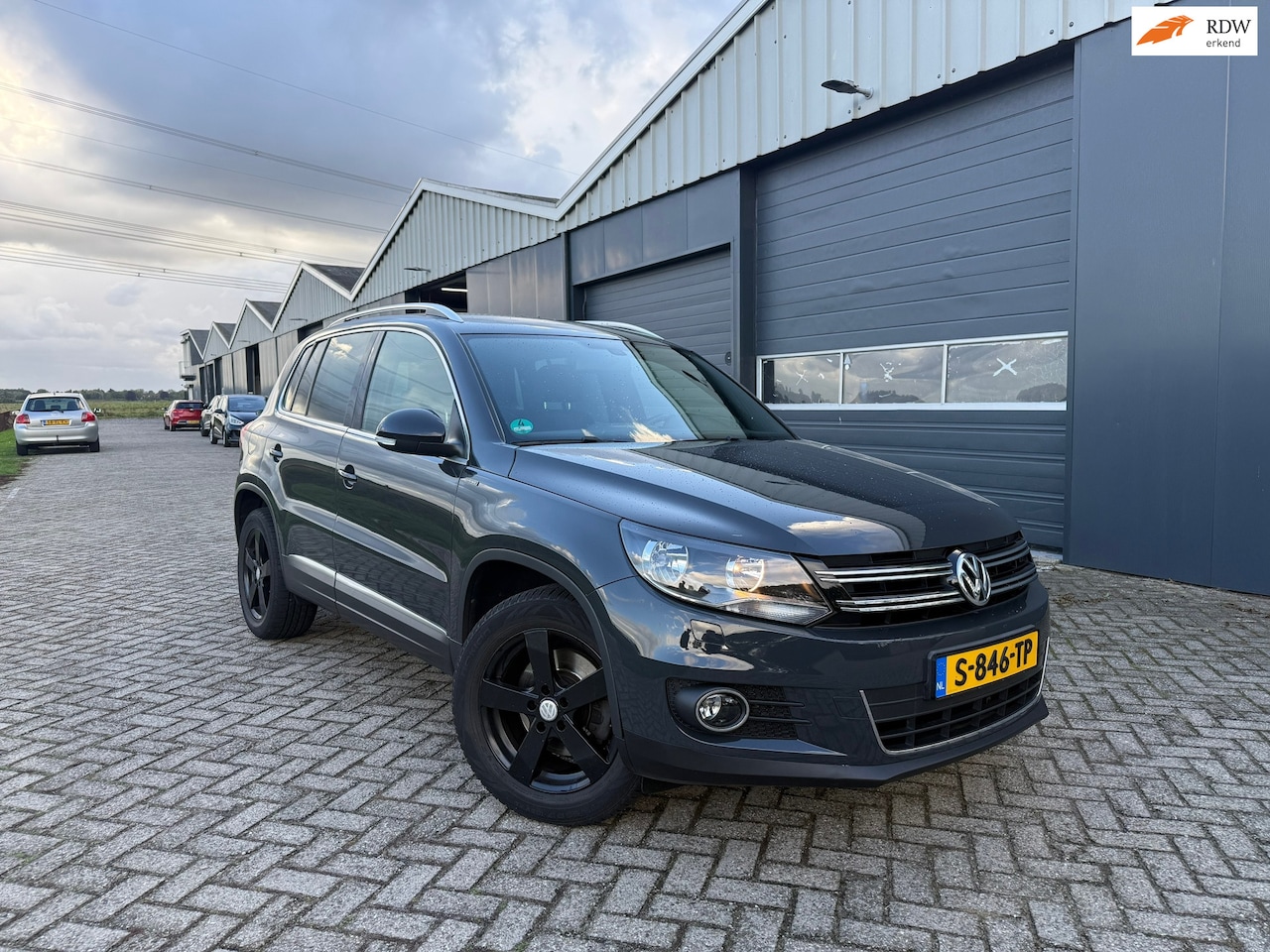 Volkswagen Tiguan - 1.4 TSI Sport&Style Lounge Edition Navi/Camera/AC - AutoWereld.nl