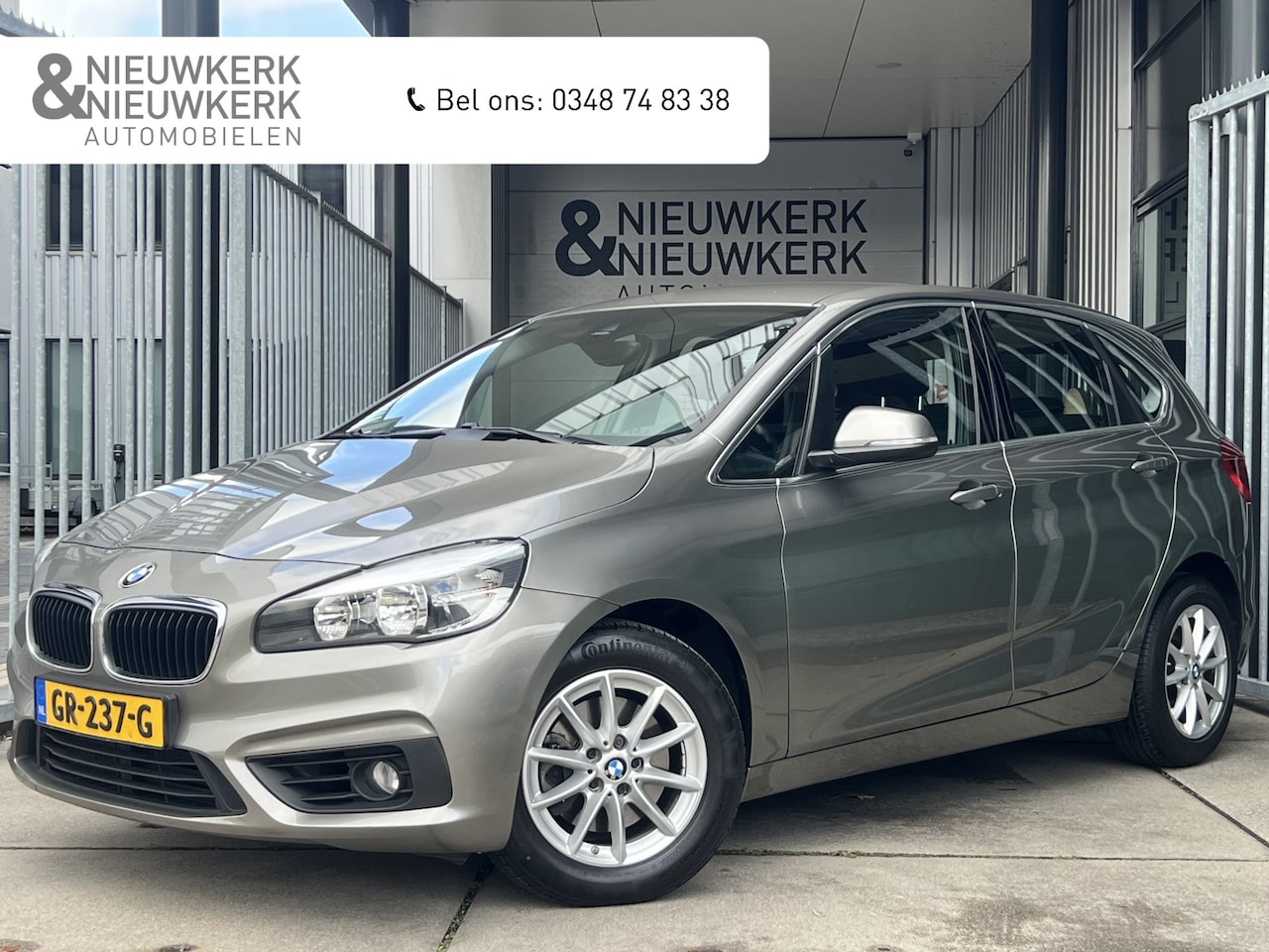 BMW 2-serie Active Tourer - 218i Essential | AUTOMAAT | TREKHAAK | NAVI | PDC | CRUISE CONTROL | CLIMATE CONTROL | LMV - AutoWereld.nl