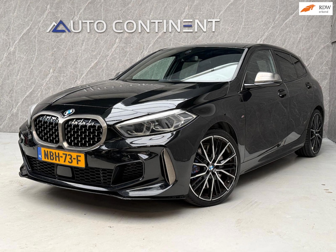 BMW 1-serie - M135i xDrive 306 PK High Executive / APK - AutoWereld.nl