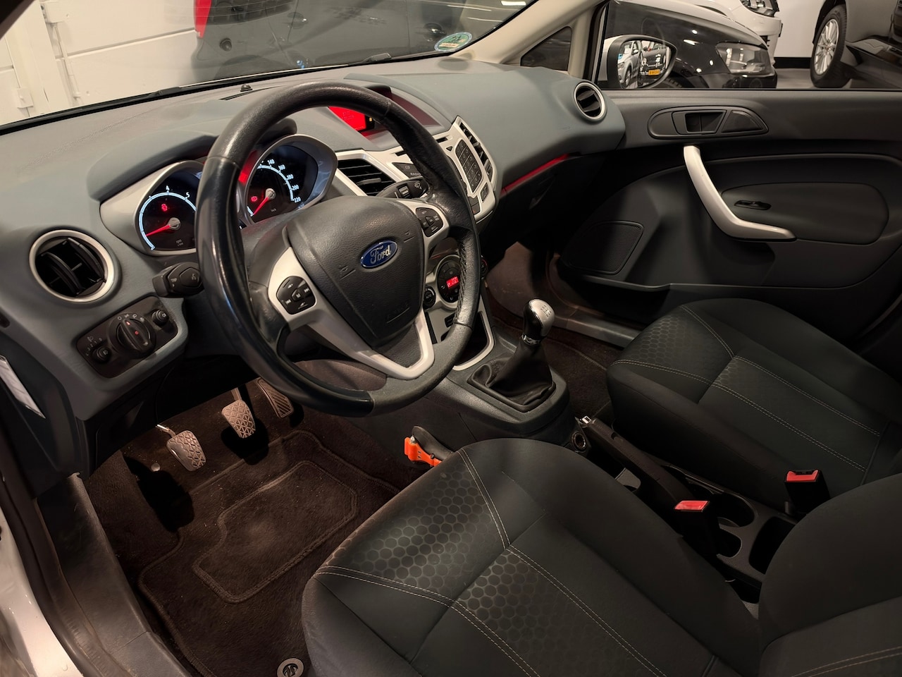 Ford Fiesta - 1.25 Titanium Nap Airco Cruise Climate Parkeersensoren 5Deurs - AutoWereld.nl