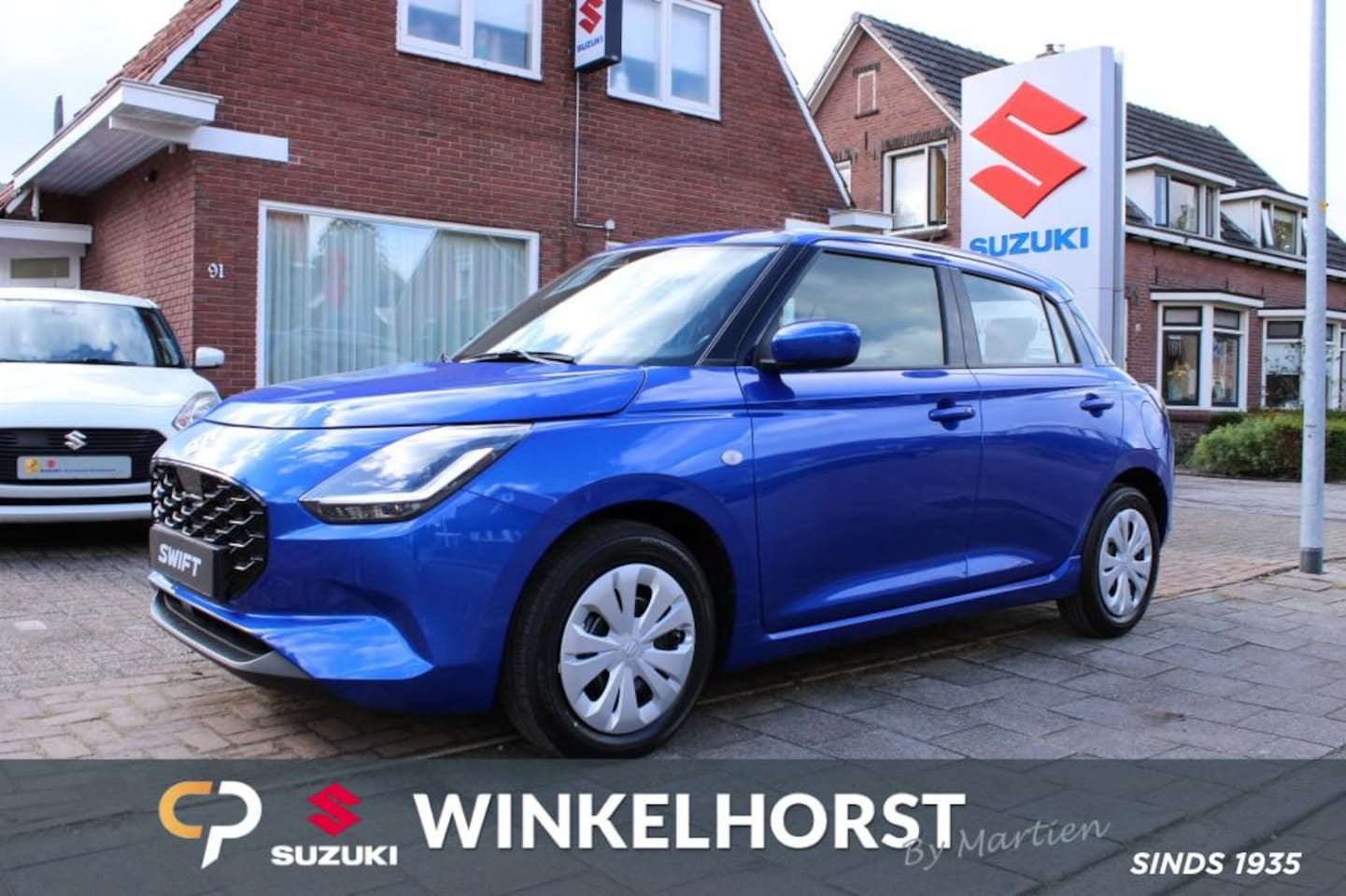 Suzuki Swift - 1.2 COMFORT SM.HYB. / €2200 KORTING / 10 JAAR GARANTIE - AutoWereld.nl