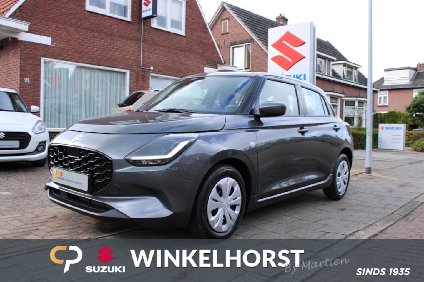 Suzuki Swift - 1.2 COMFORT SM.HYB. / €2200 kortin / 10 jaar garantie - AutoWereld.nl