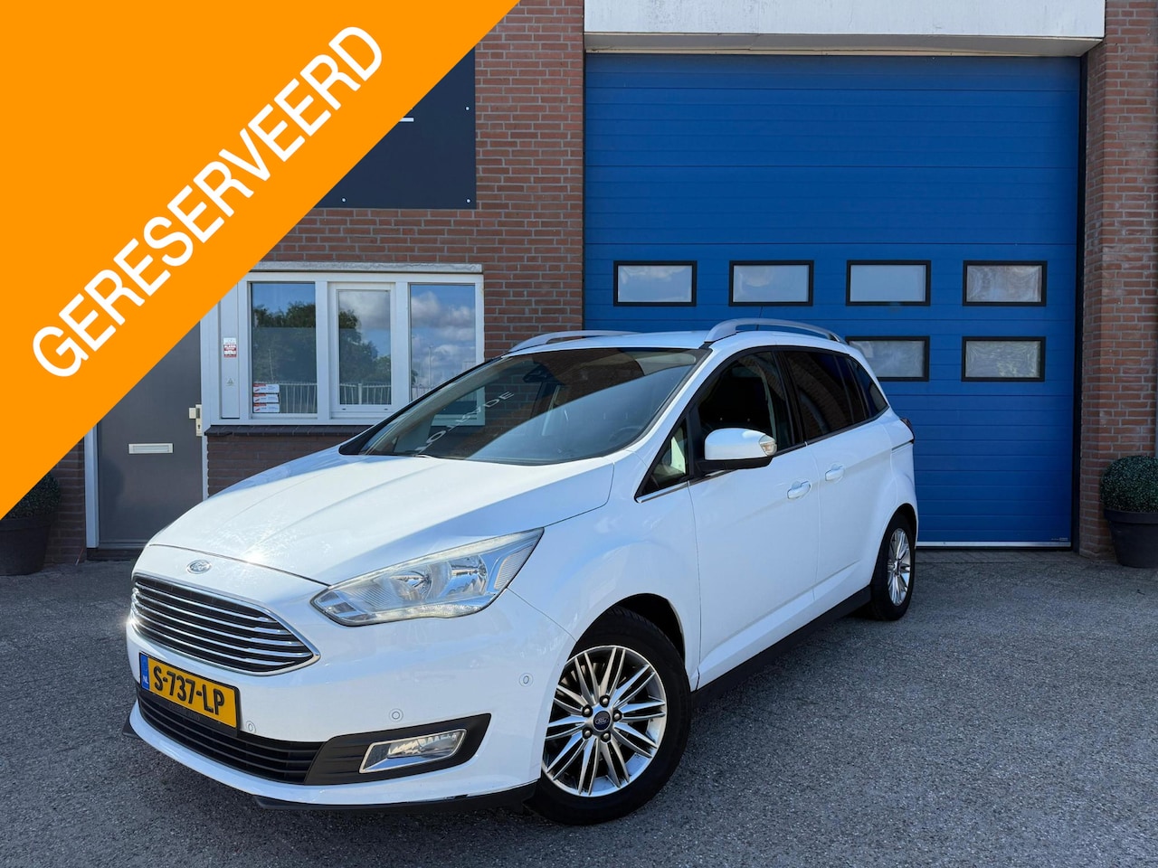 Ford Grand C-Max - 1.0 Titanium 7p. | Cam | Stoelverwarming | PDC | Trekhaak | - AutoWereld.nl