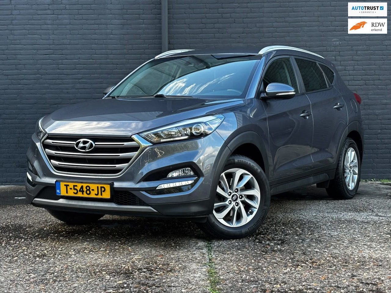 Hyundai Tucson - 1.6 GDi Comfort TREKHAAK|CARPLAY|STOELVER|CAMERA|NAVI - AutoWereld.nl