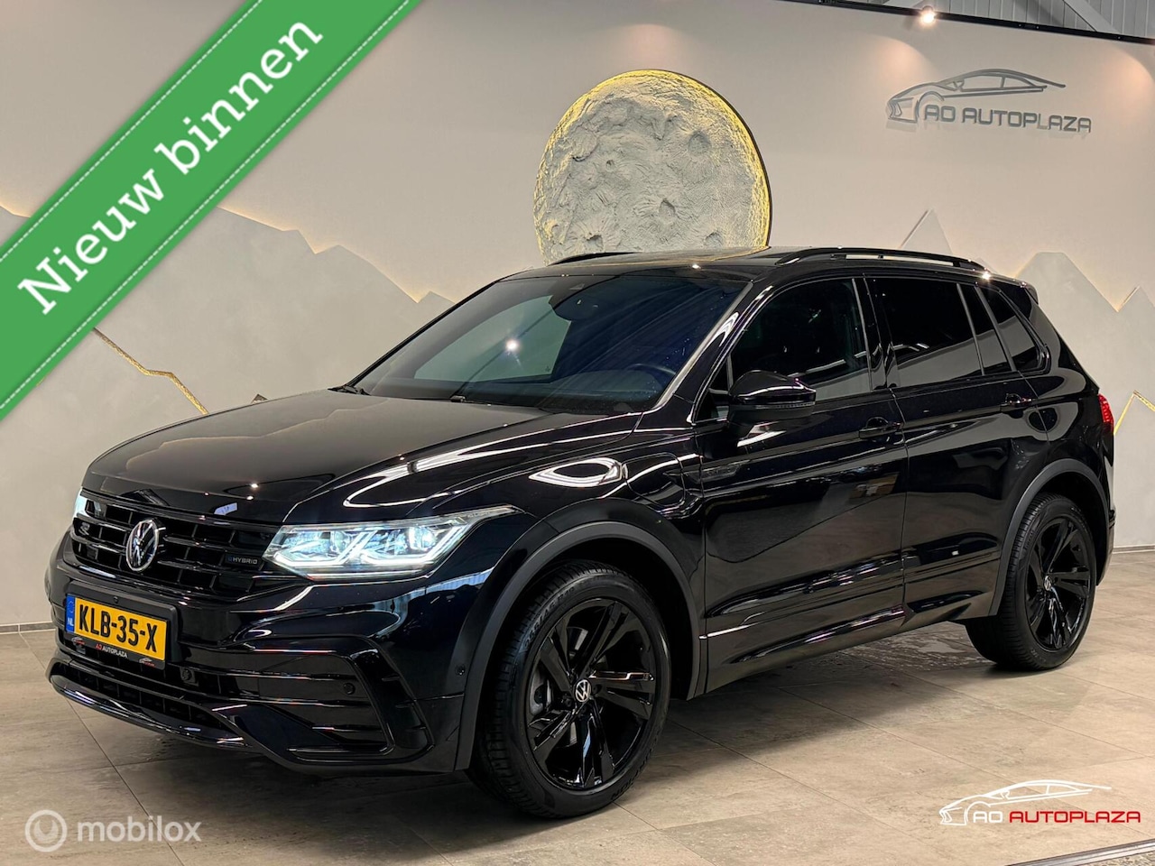 Volkswagen Tiguan - 1.4 TSI eHybrid 2x R-Line Panorama/Leder/360/Keyless - AutoWereld.nl