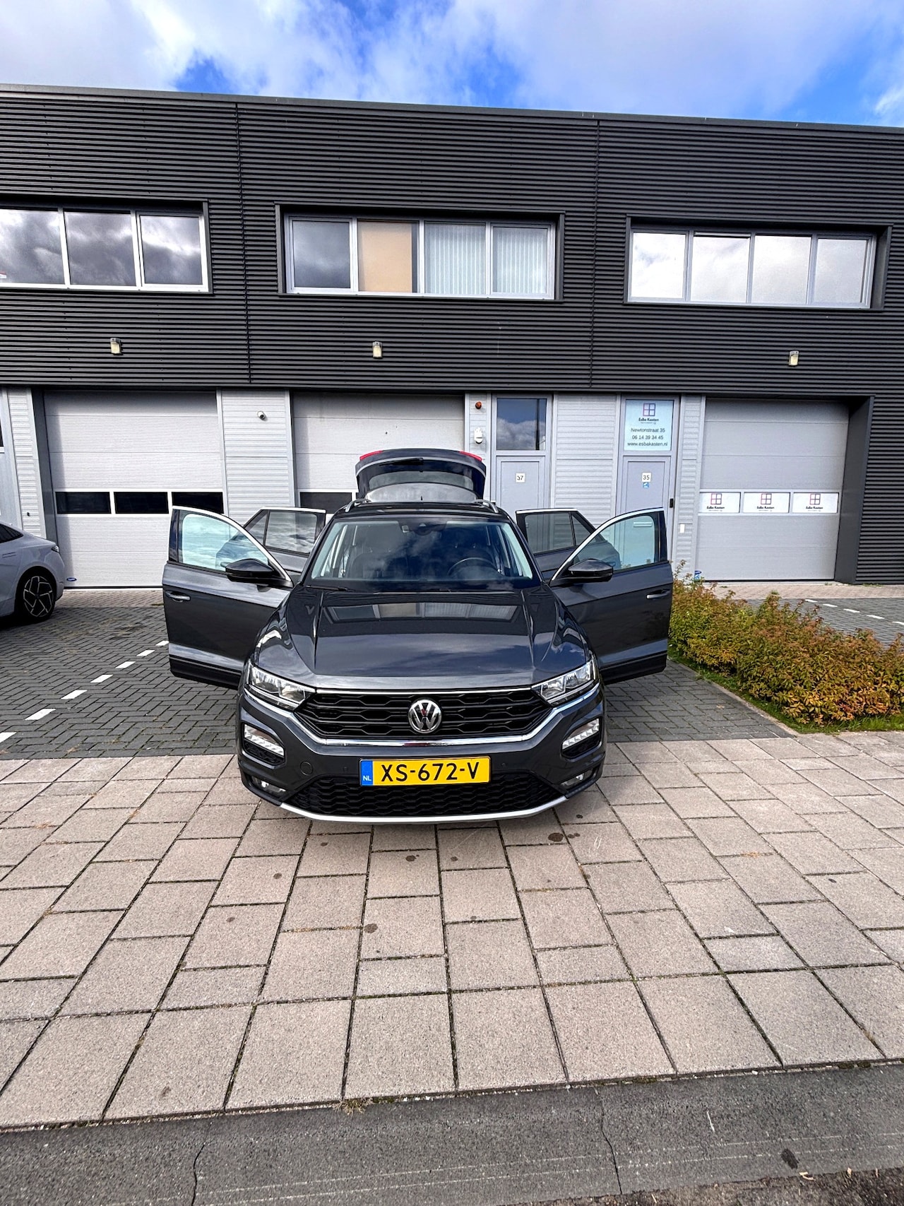 Volkswagen T-Roc - 1.5 TSI Sport Business R 1e eigenaar - AutoWereld.nl