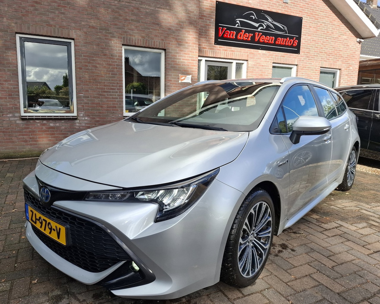 Toyota Corolla Touring Sports - 2.0 Hybrid First Edition. 2 liter! Dealer onderhouden, camera, cruise, navi, trekhaak, led - AutoWereld.nl