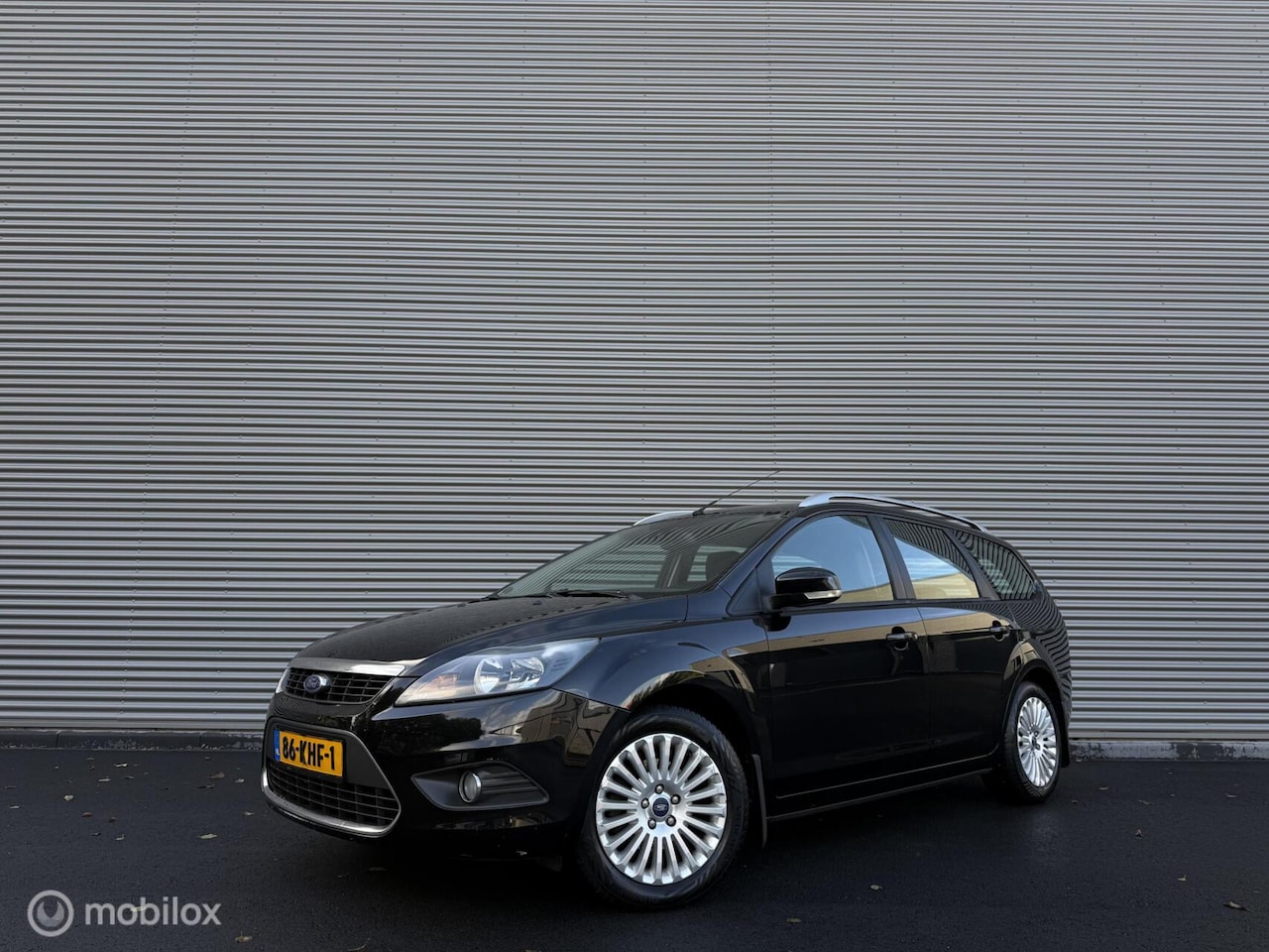 Ford Focus Wagon - 1.8 Titanium | Trekhaak | Clima | Leder | Cruise | Navi | 2 eig | Dealer onderhouden - AutoWereld.nl