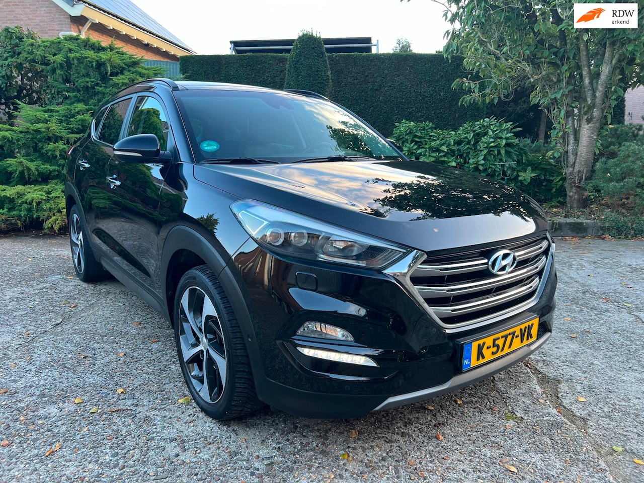 Hyundai Tucson - 1.6 T-GDi Premium 4WD, Pano, Leder, Navi, Full options! - AutoWereld.nl