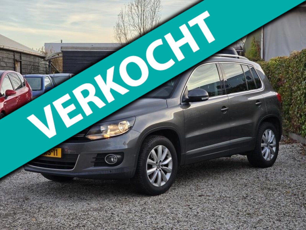 Volkswagen Tiguan - 1.4 TSI Sport&Style Navi/Trekhaak - AutoWereld.nl