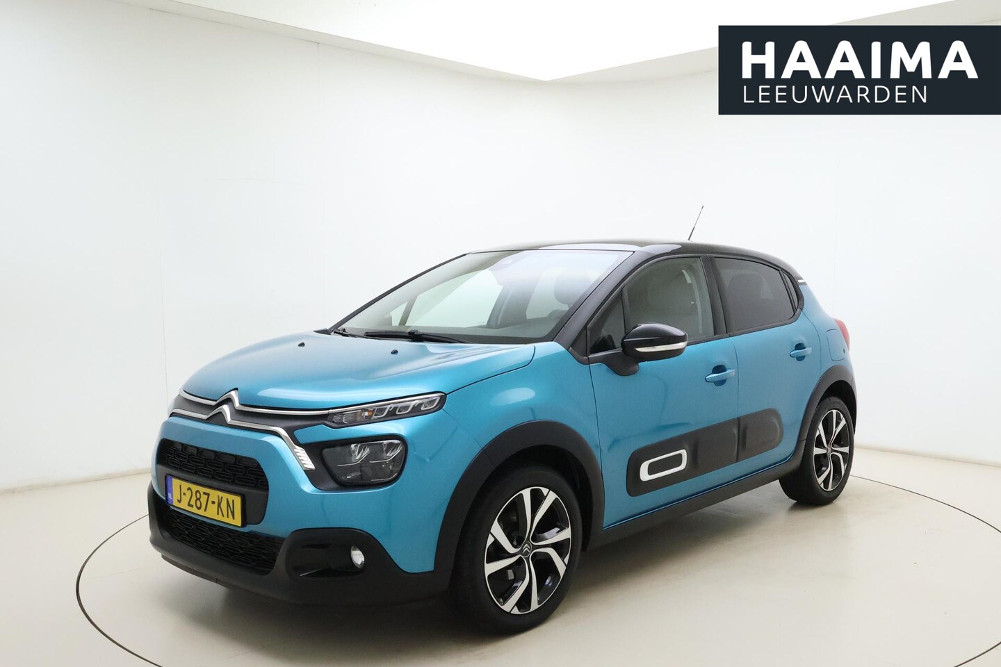 Citroën C3 - 1.2 PureTech Shine | Metallic zwart dak | Airco automatisch | Cruise control | Camera acht - AutoWereld.nl