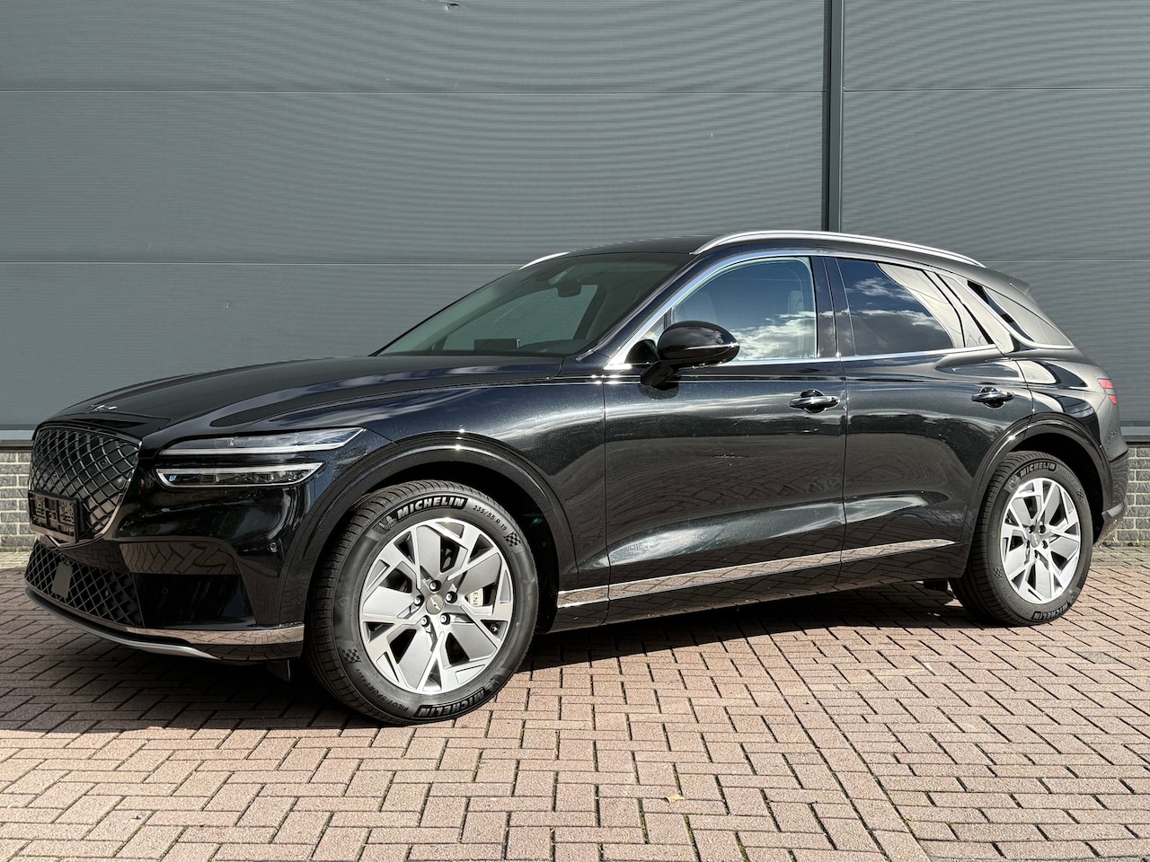 Genesis GV70 - Sport 4WD / 490 PK / 4WD vierwielaandrijving / Sport uitvoering / 21 inch lichtmetalen vel - AutoWereld.nl