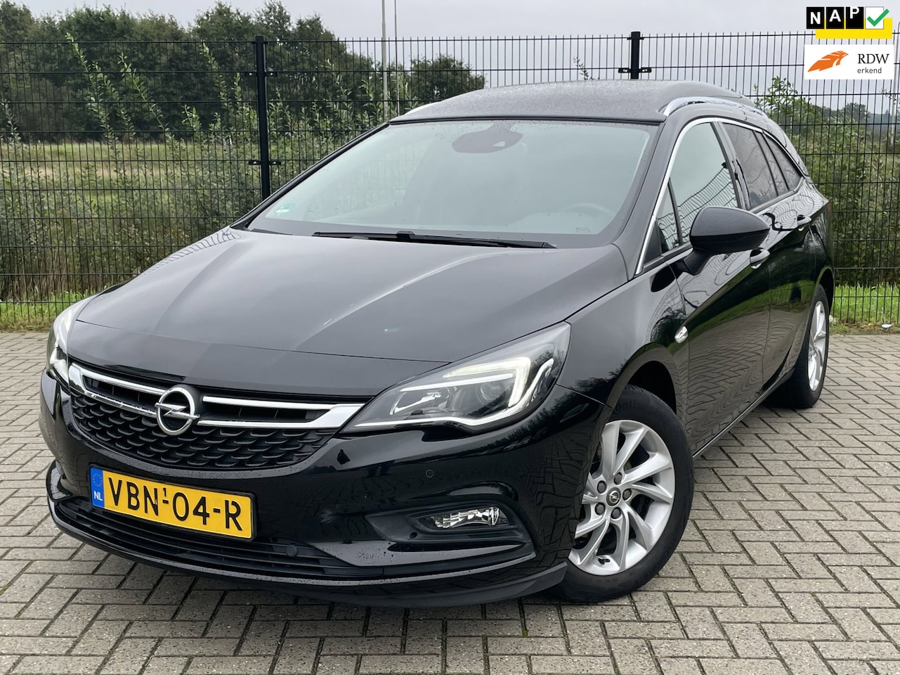 Opel Astra Sports Tourer - TOURER+ | Grijs Kenteken | Carplay | PDC | Trekhaak | 1ste eigenaar | - AutoWereld.nl