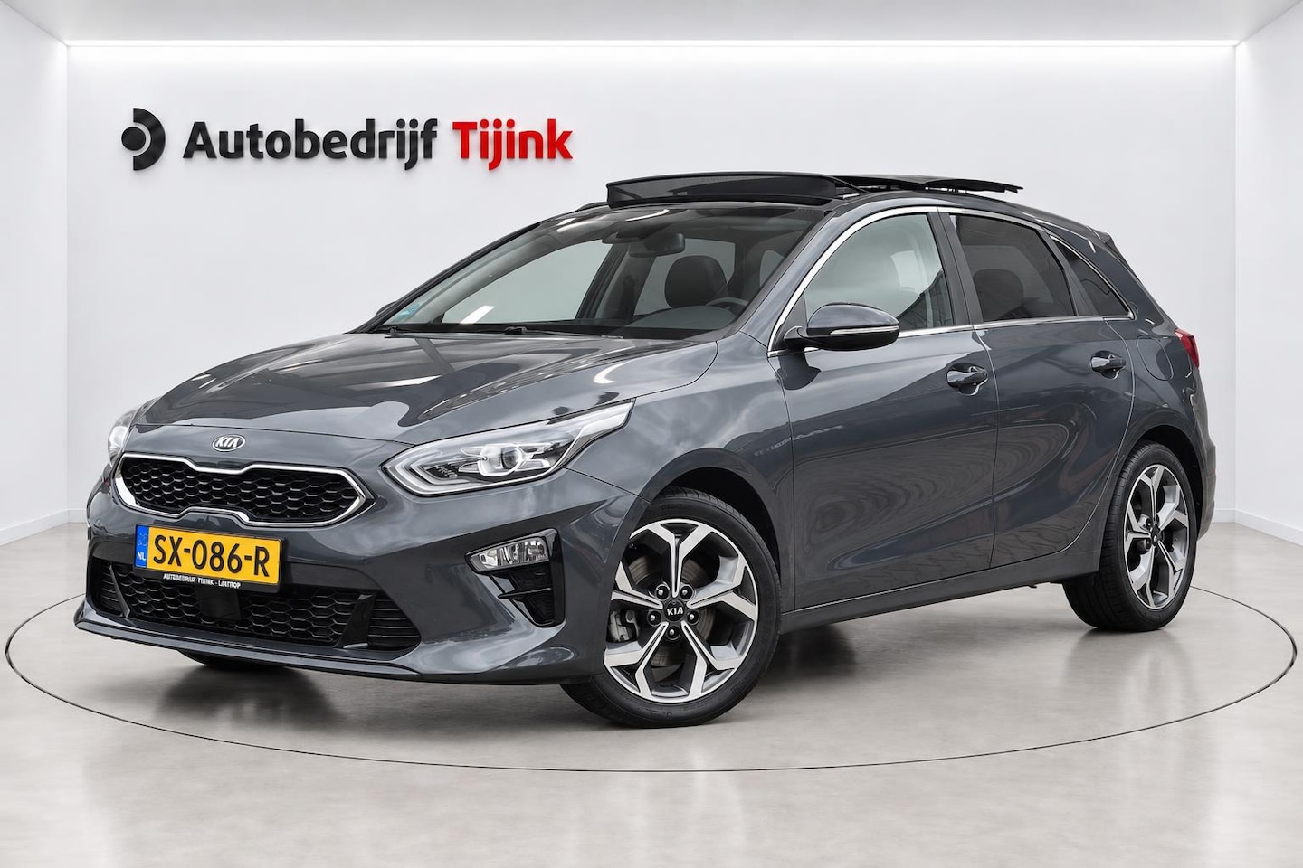 Kia Cee'd - Ceed 1.4 T-GDi ExecutiveLine | Navi | Pano | Trekhaak | Leer | Stoelverwarming | Keyless | - AutoWereld.nl